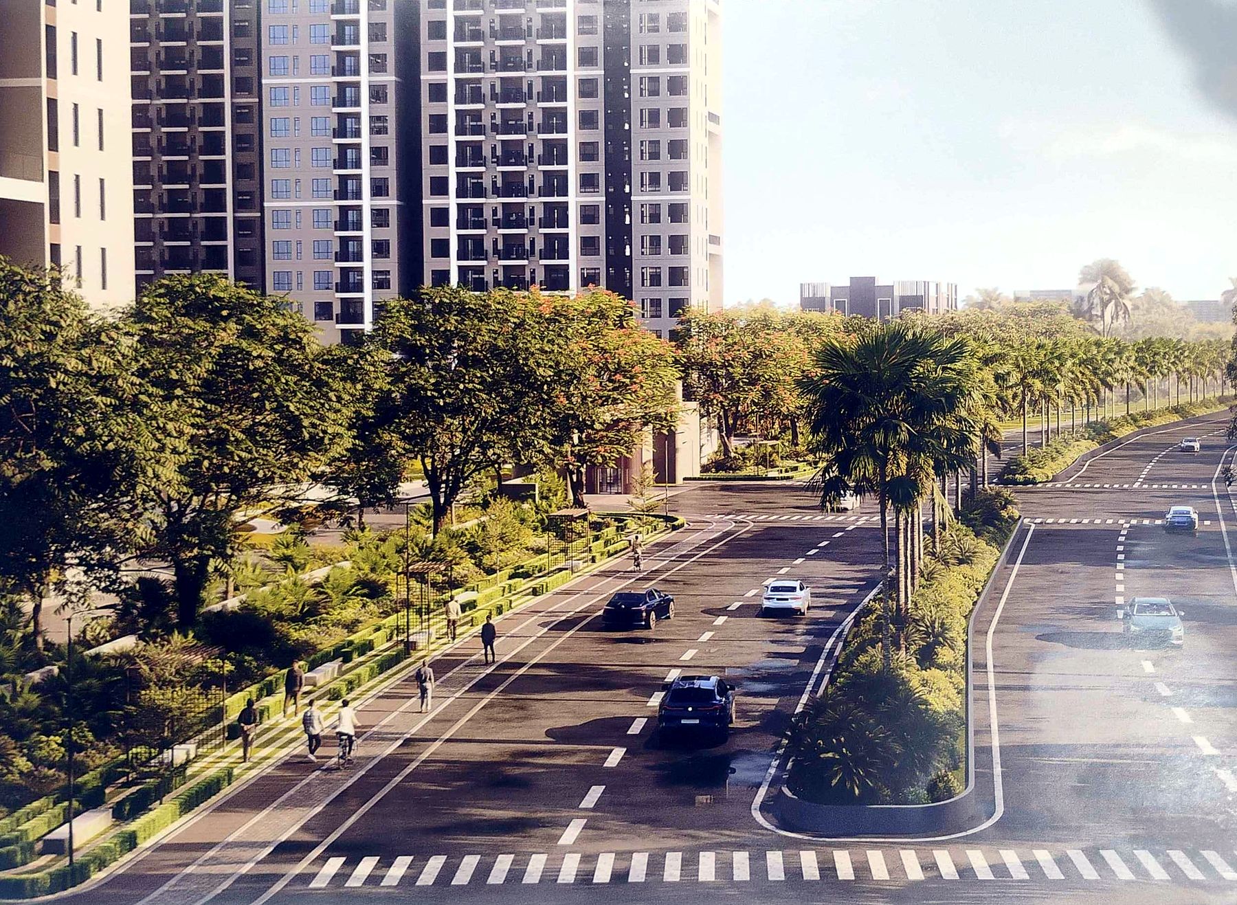 Tree-lined boulevard with cycle track in front of the towers